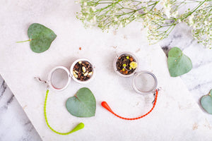 Filtro Bola inox Infusor com corrente de silicone verde - Tea Shop - Tea Shop Brasil